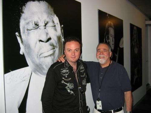 Gogo and XM's Bluesville host Bill Wax under the watchful eye of B.B. King.